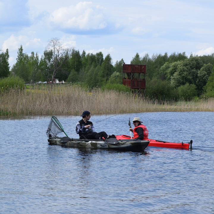 Kova kajakki Pedal Fisher ja Trek